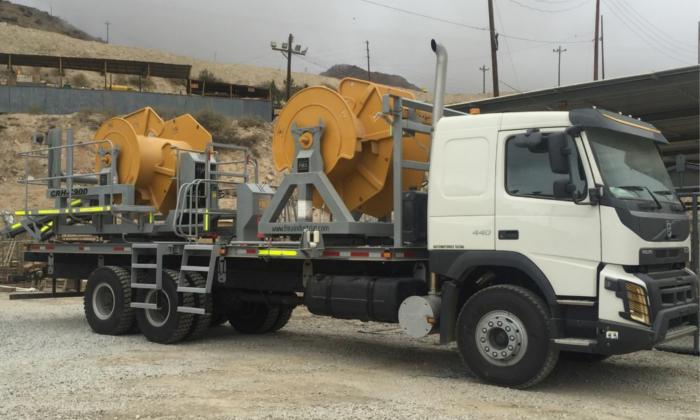 Enrrollador de cable sobre camión